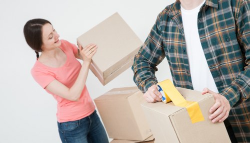 Professional house removalists loading furniture in Camden