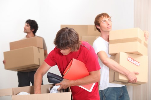 Professional removal team handling a Camden move in a busy London street