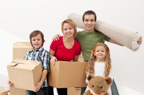 Professional movers handling office furniture during a Camden relocation