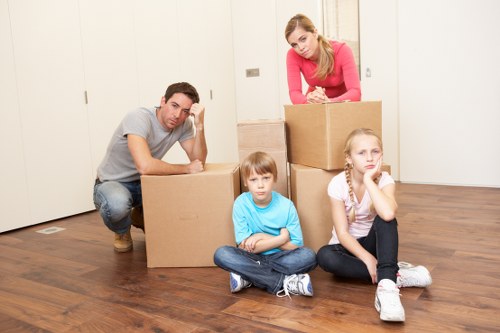 Careful packing of household items with Camden moving support