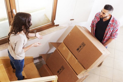 Packed moving boxes and household items ready for transport