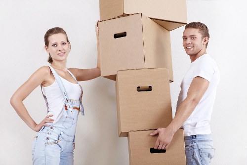 Removalists carrying furniture safely during a house move in Camden