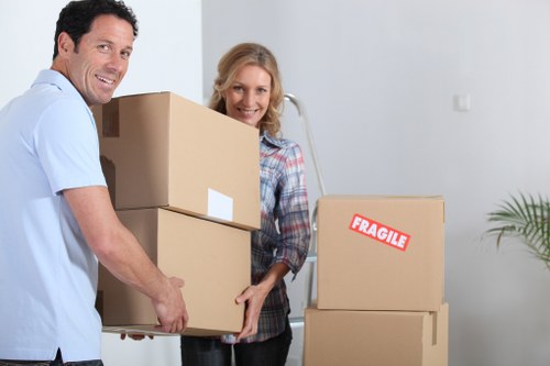Packing boxes and furniture before loading a moving truck